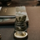 Cannabis in glass jar on desk.